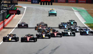 Formula 1 cars crossing the line